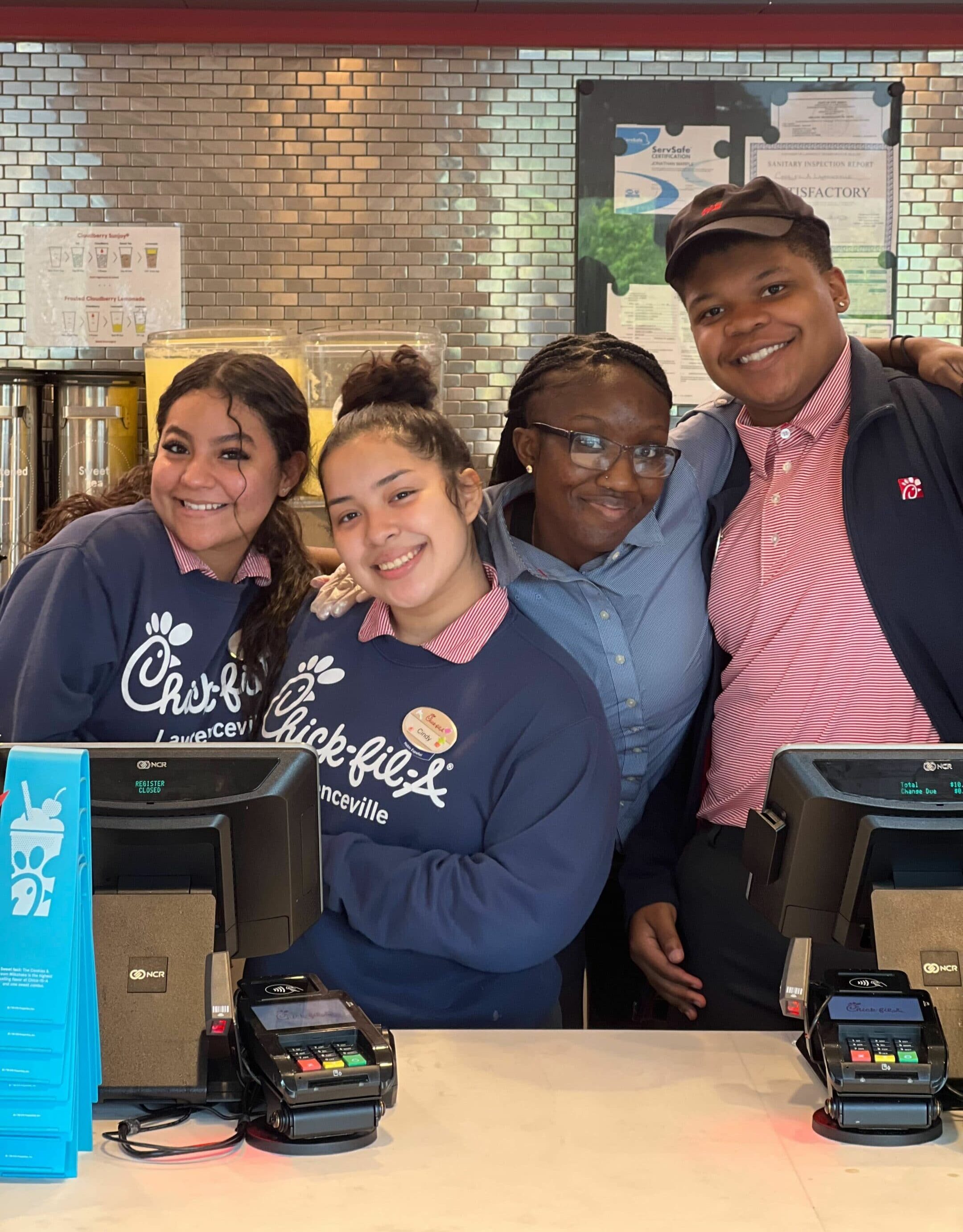 man_smiling_at_register